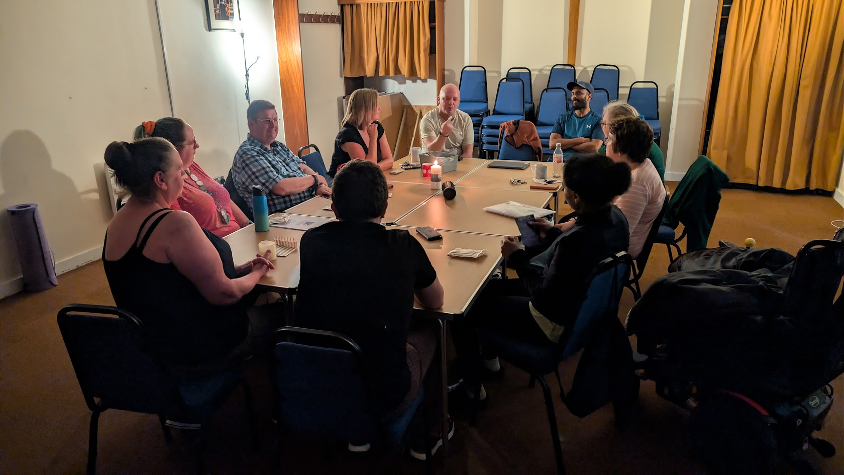 ADHD Unite meditation evening group sitting together around tables at St Matthew's Community Hall